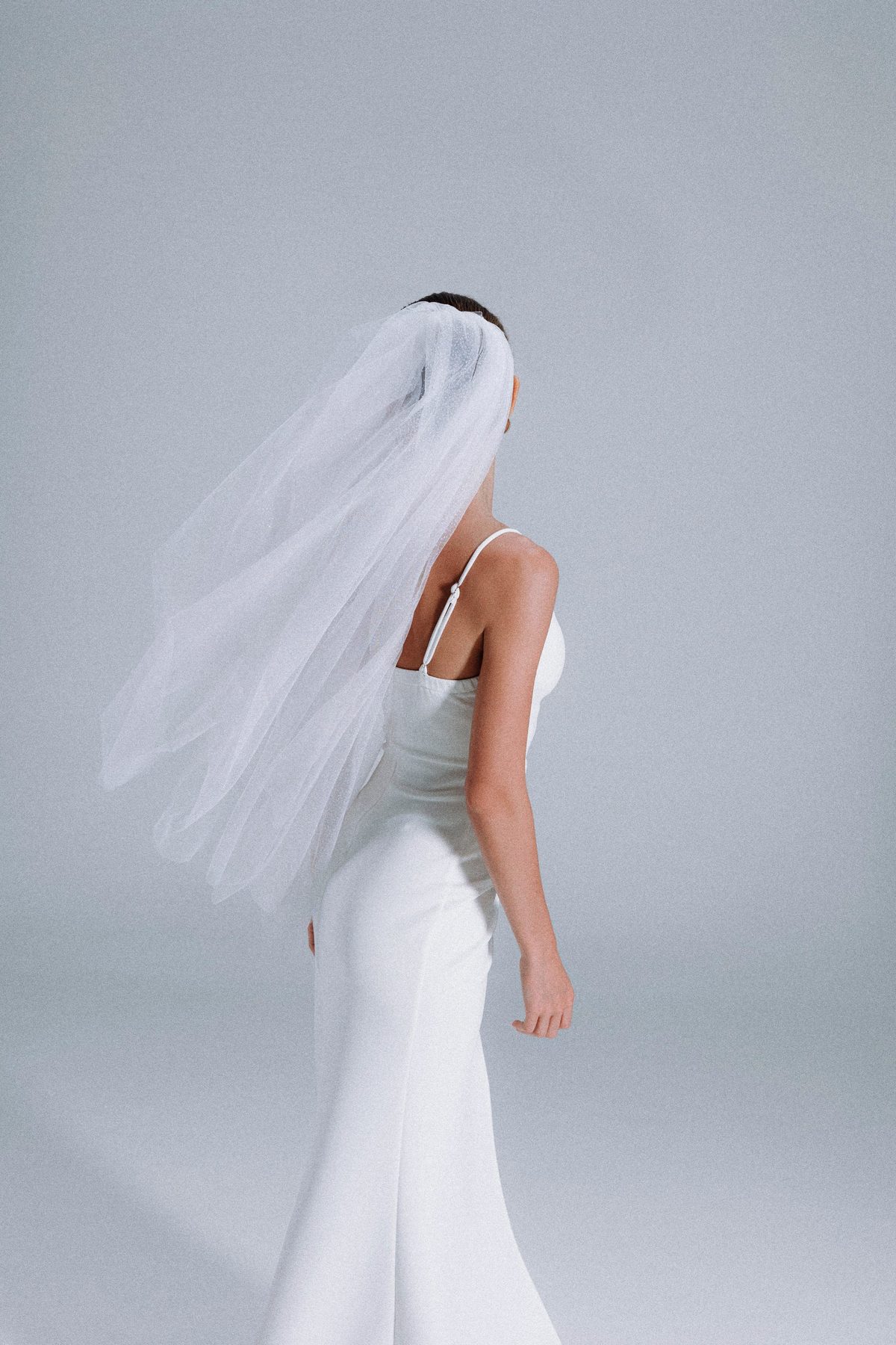 Modern bridal look with veil