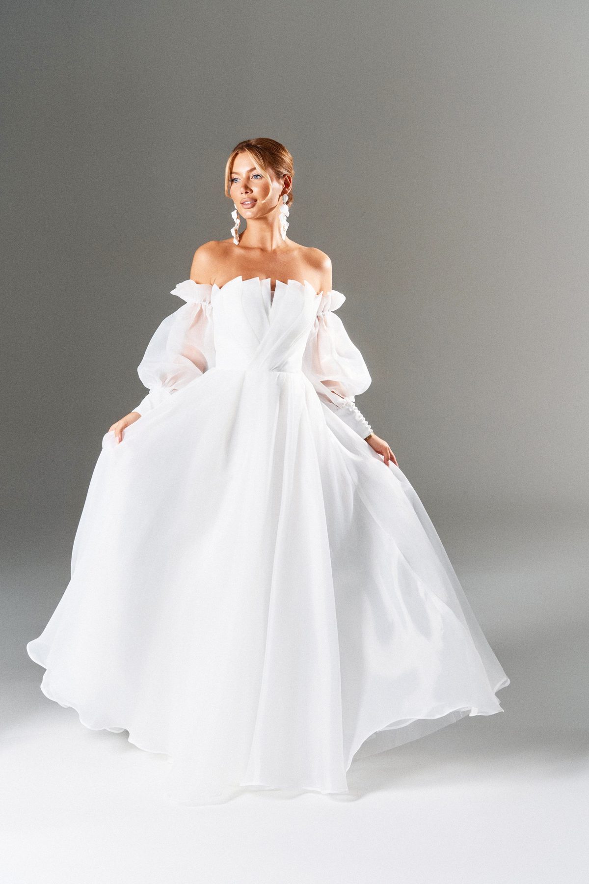 White organza gown with voluminous sleeves